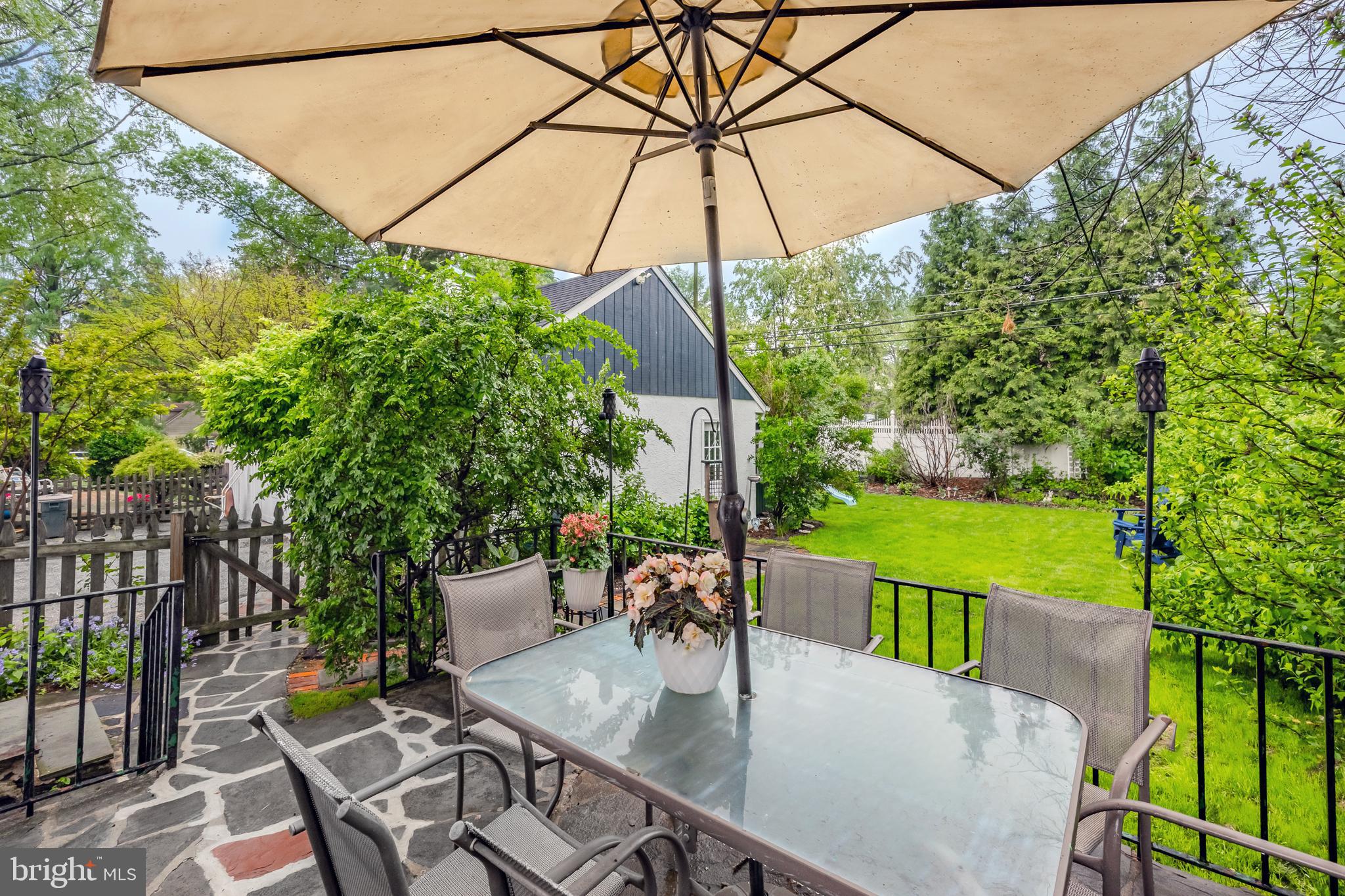2710 Prescott Road Havertown, PA 19083 - Photo 34 of 38 a patio with glass top table and chairs