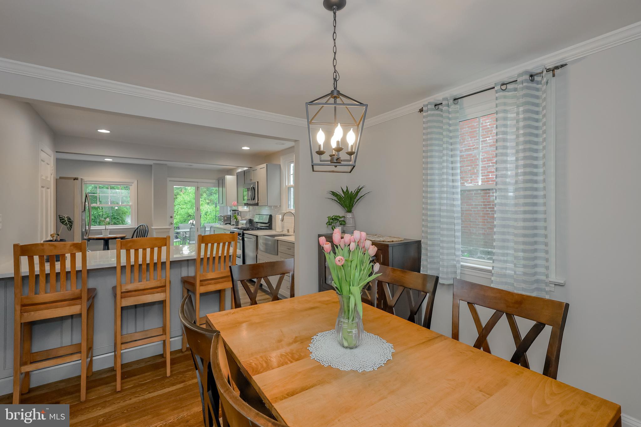 2710 Prescott Road Havertown, PA 19083 - Photo 9 of 38 a view of a dining room with furniture window and wooden floor