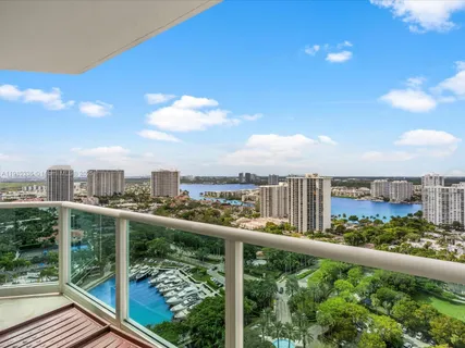 a view of a city skyline from a balcony