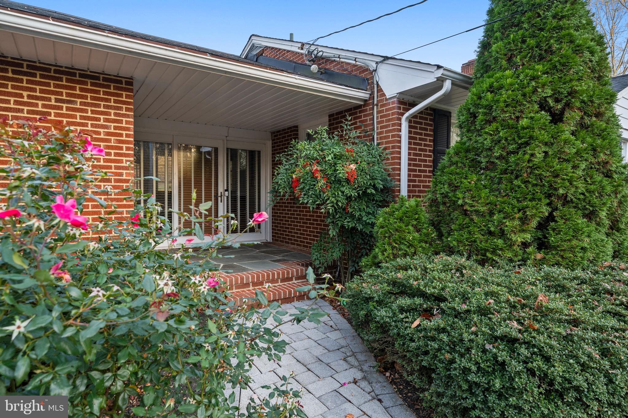 6159 Solomons Island Road Tracys Landing, MD 20779 - Photo 54 of 65 a view of a house with potted plants
