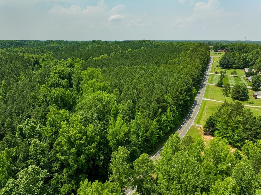 0 Mill Creek Road Roxboro, NC 27574 - Photo 28 of 54 a view of a lush green space next to a yard