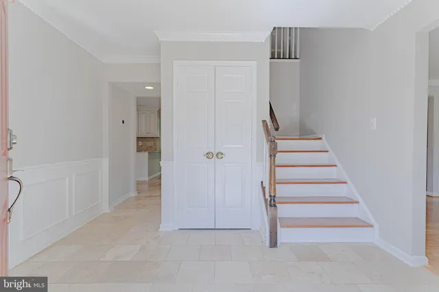 a view of entryway with wooden floor