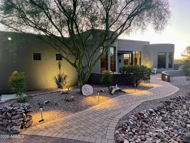 an aerial view of a house with a garden