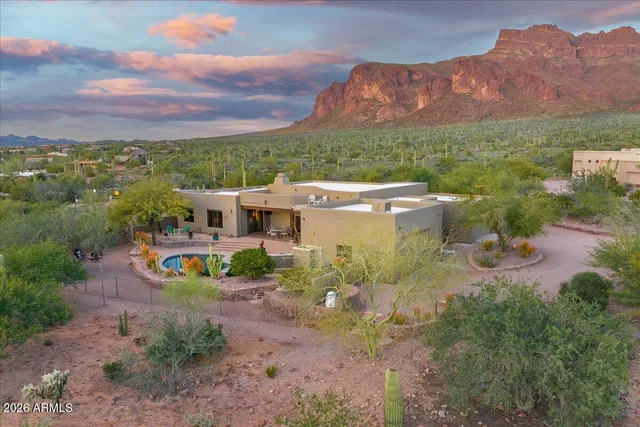 an aerial view of a house with a garden