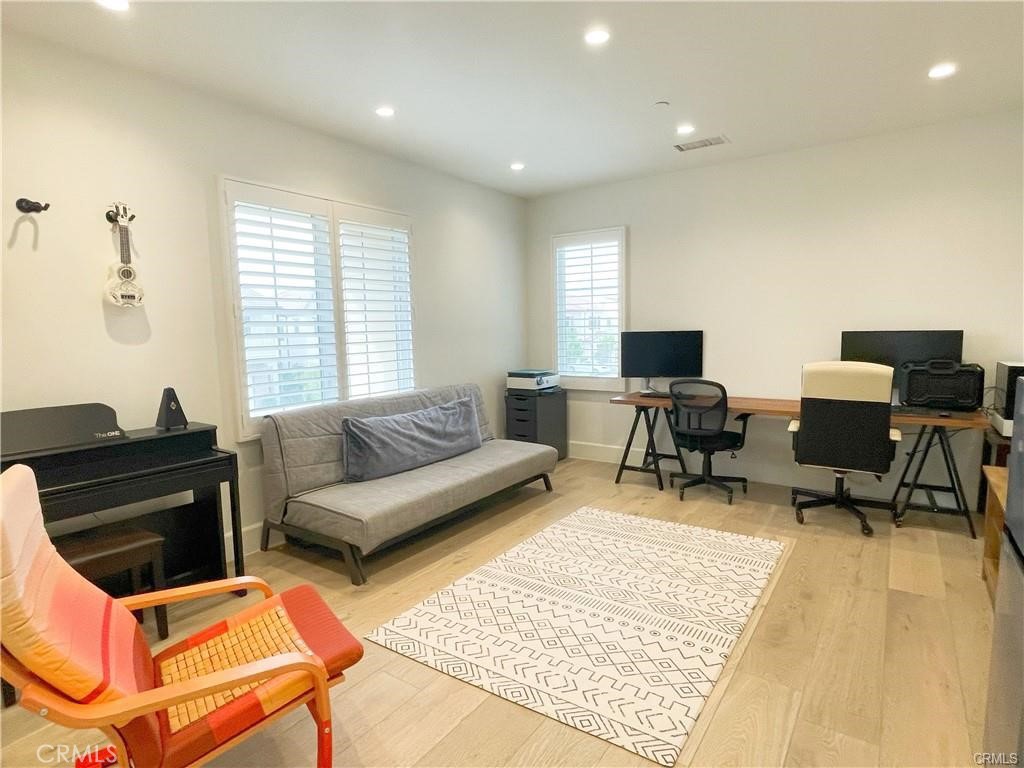 120 Statura Irvine, CA 92602 - Photo 12 of 27 a living room with furniture rug and a window