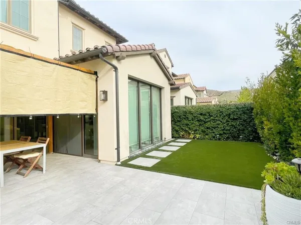 a house view with a outdoor space