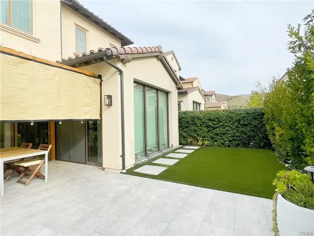 a house view with a outdoor space