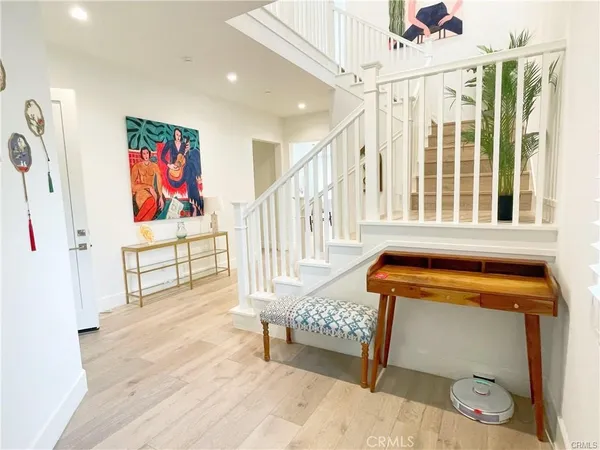 a bedroom with furniture and white walls