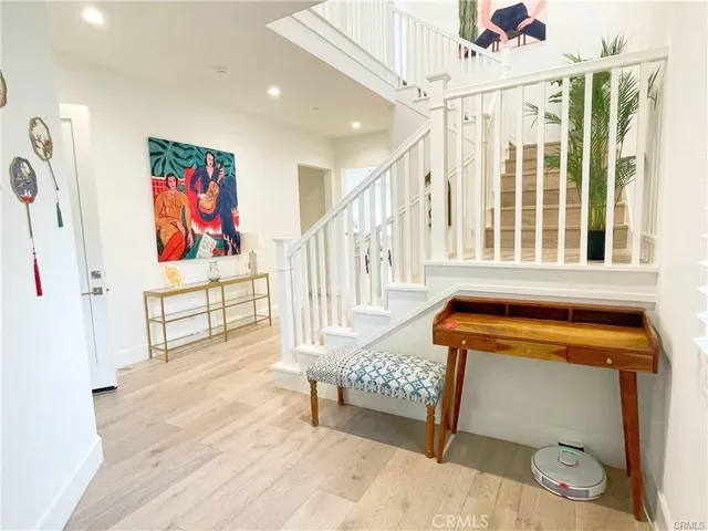 a bedroom with furniture and white walls