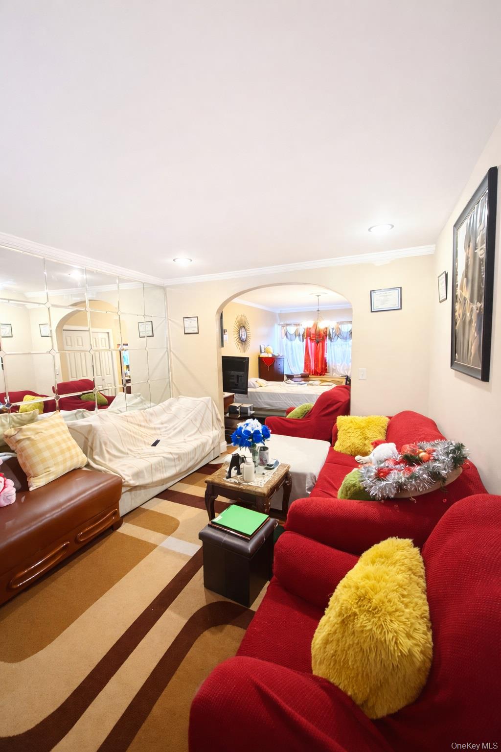 179-15 Selover Road Queens, NY 11434 - Photo 3 of 16 a bedroom with furniture and a couch