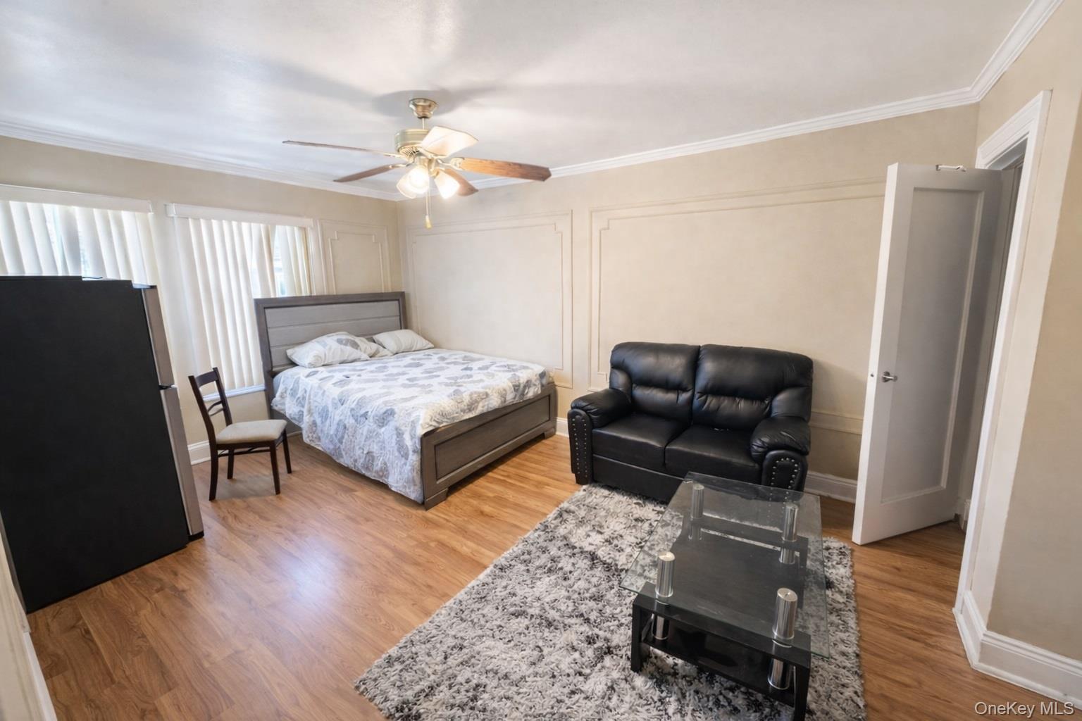 179-15 Selover Road Queens, NY 11434 - Photo 6 of 16 a living room with furniture and a rug