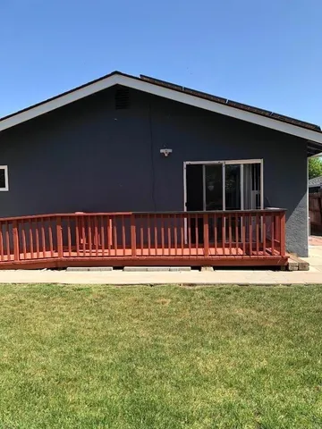 a balcony with view of outdoor space