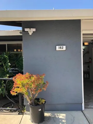 a vase of flowers sitting on a table
