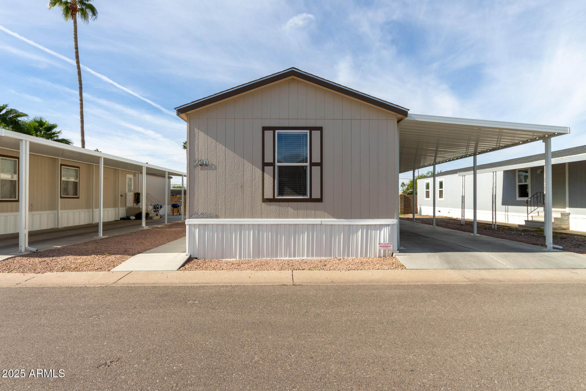 a front view of a house with a garage