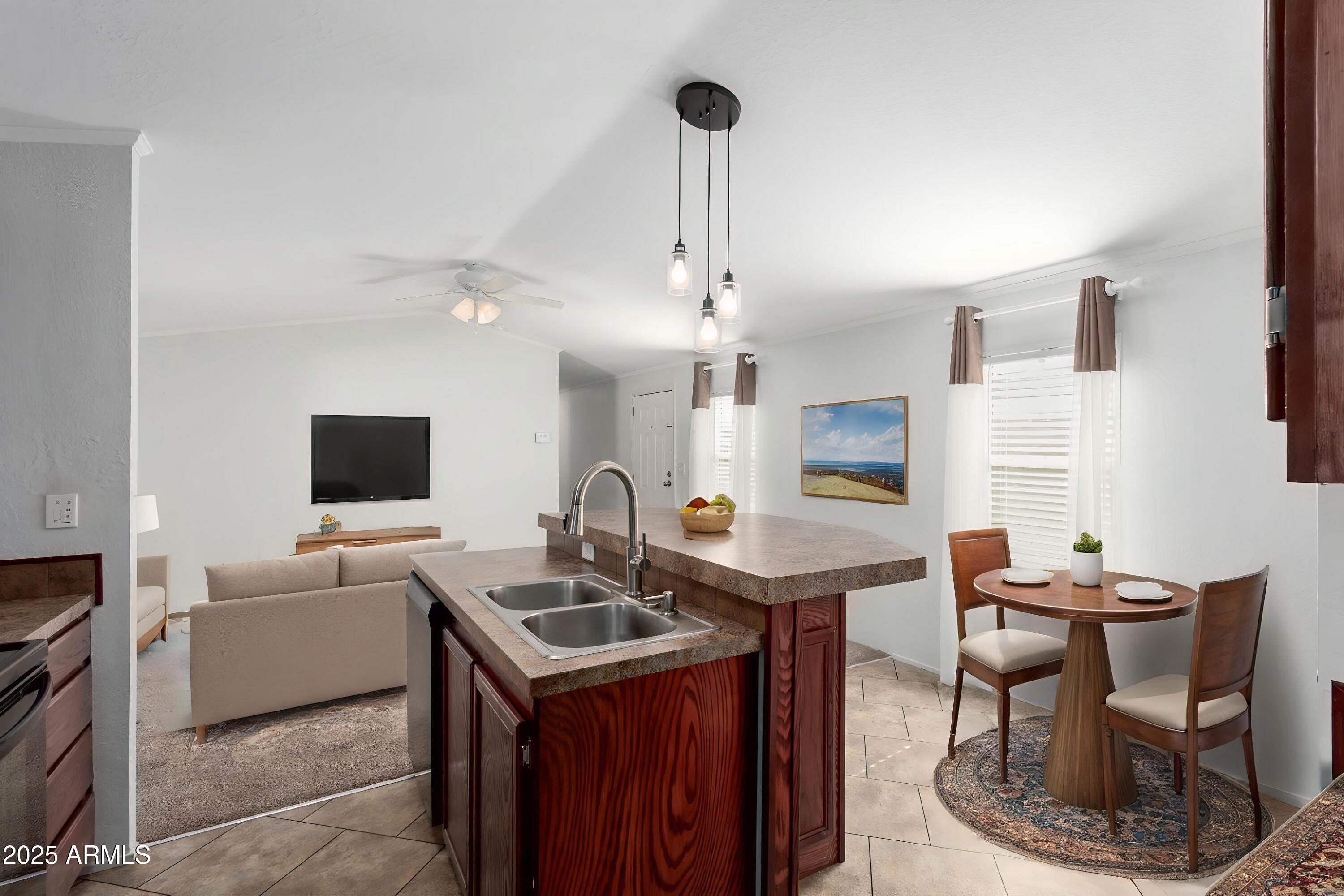 320 East McKellips Road, Unit 230 Mesa, AZ 85201 - Photo 10 of 43 a view of a dining room with furniture