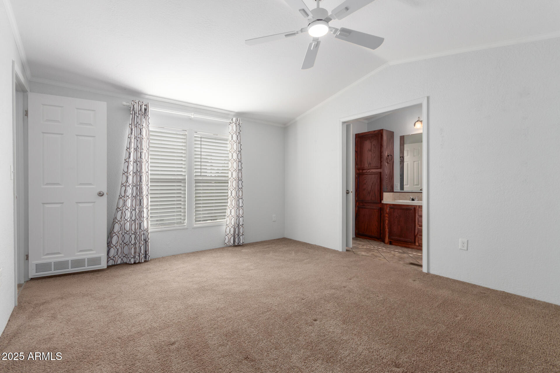 320 East McKellips Road, Unit 230 Mesa, AZ 85201 - Photo 14 of 43 a view of an empty room with a window