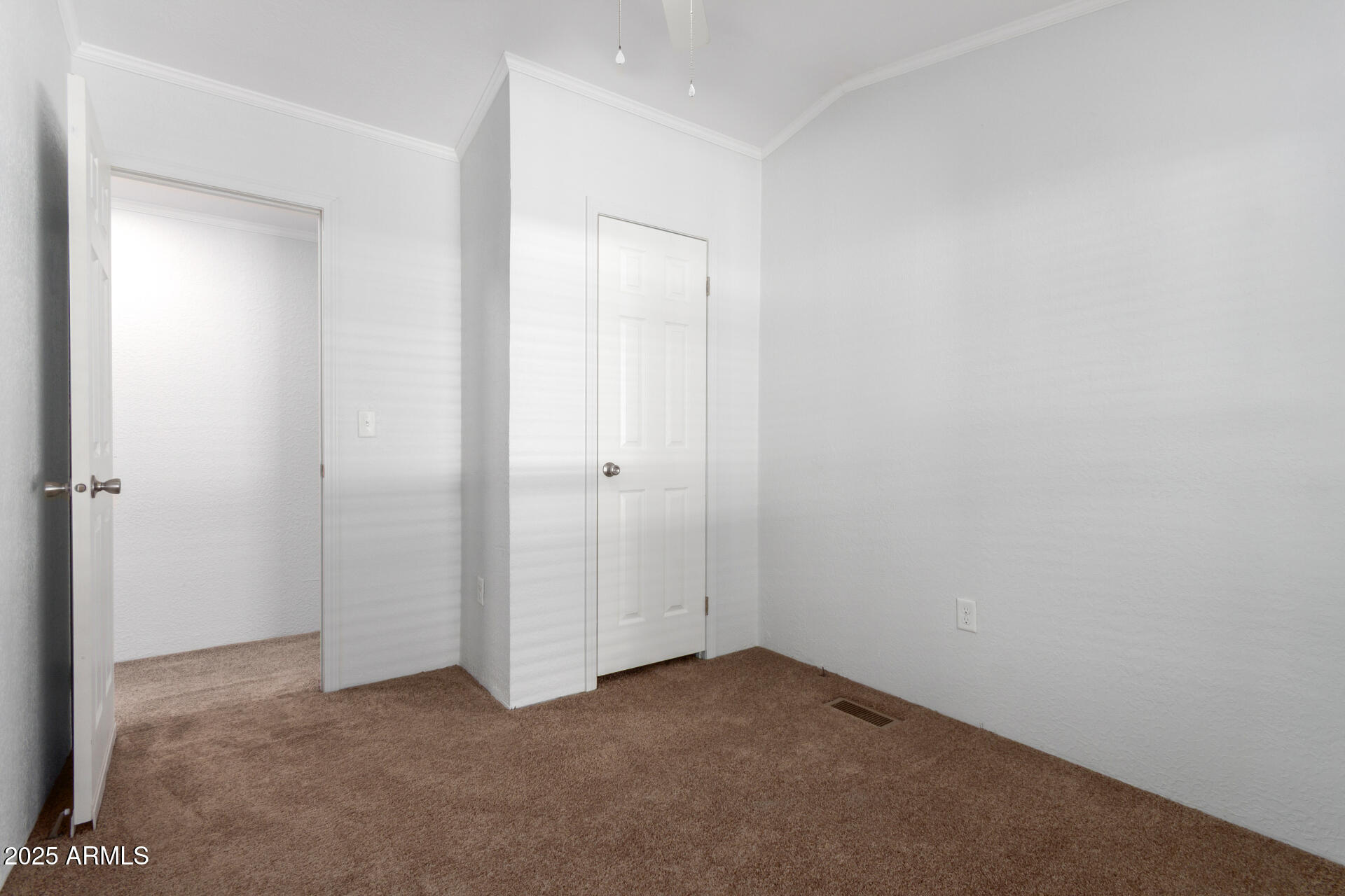 320 East McKellips Road, Unit 230 Mesa, AZ 85201 - Photo 21 of 43 an empty room with closet area