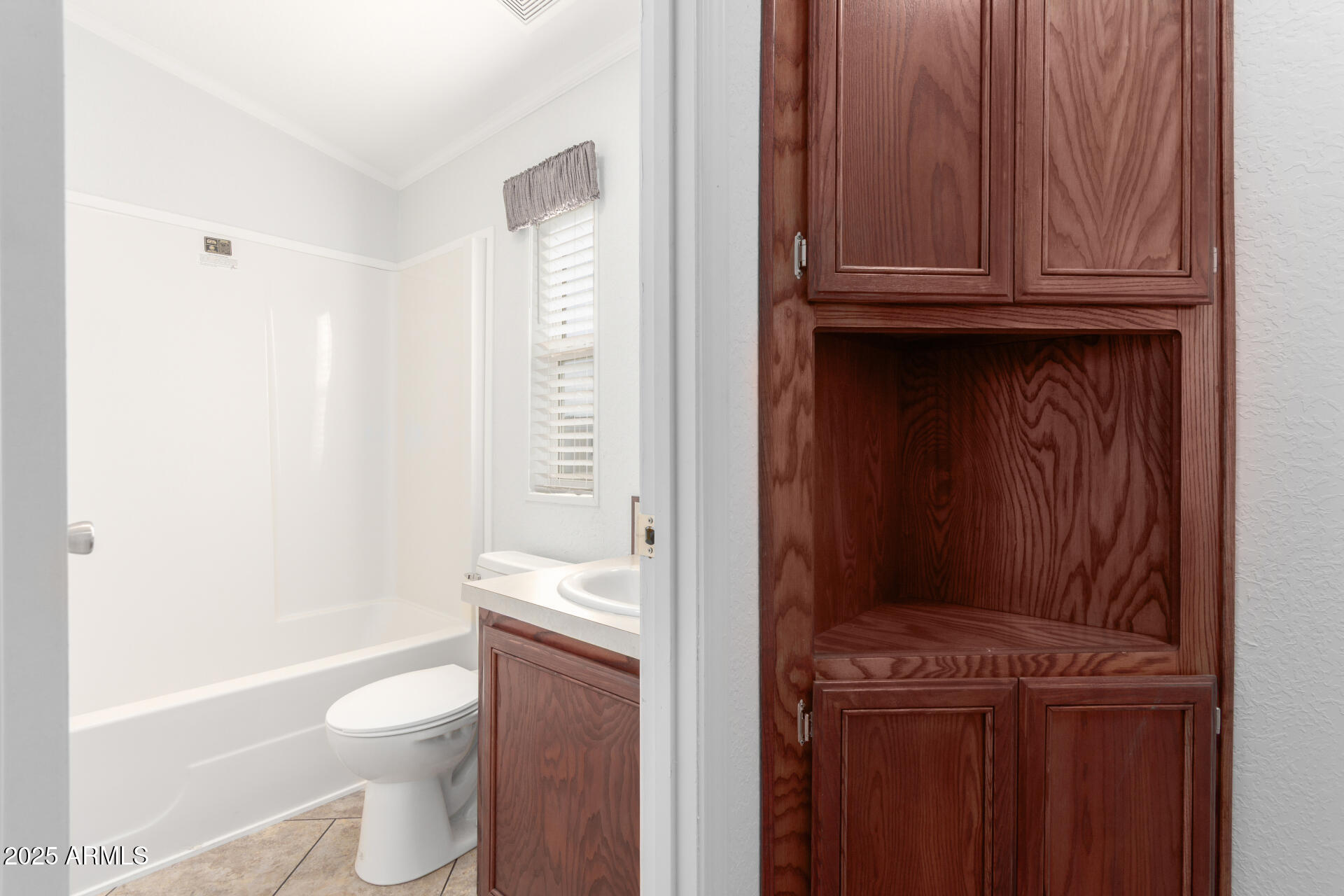 320 East McKellips Road, Unit 230 Mesa, AZ 85201 - Photo 22 of 43 a bathroom with a toilet a sink and bathtub