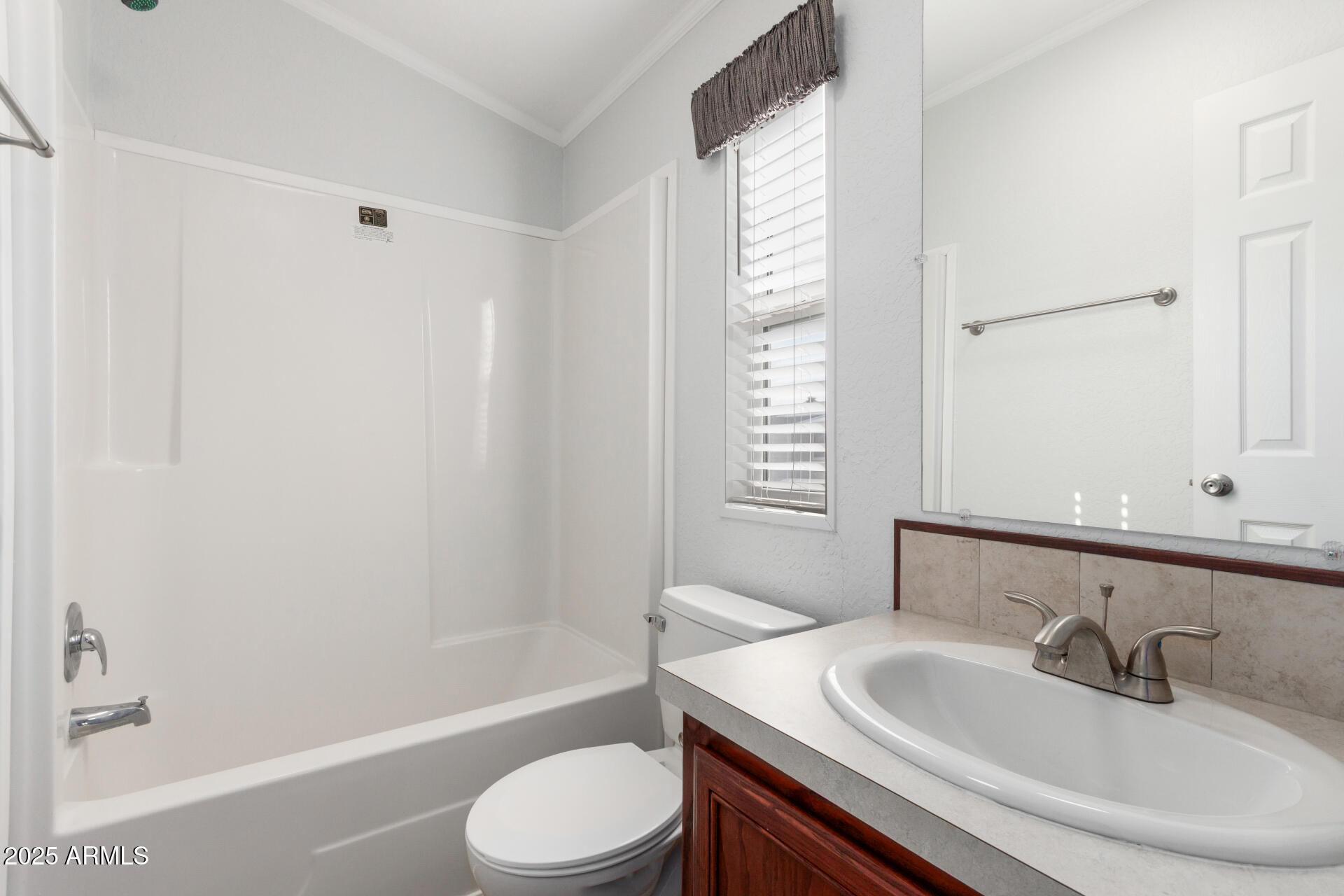 320 East McKellips Road, Unit 230 Mesa, AZ 85201 - Photo 26 of 43 a bathroom with a sink toilet and shower