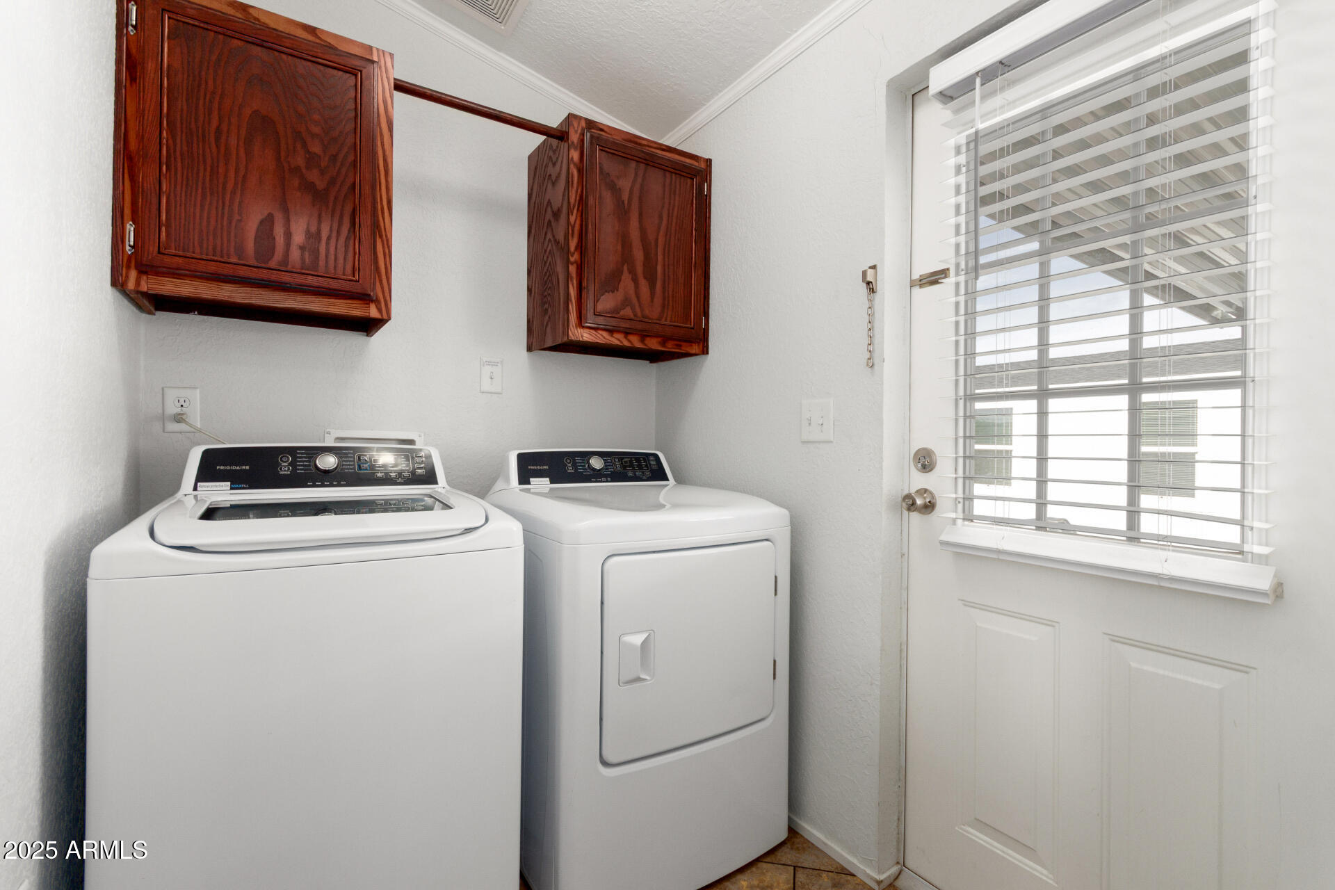 320 East McKellips Road, Unit 230 Mesa, AZ 85201 - Photo 27 of 43 a utility room with dryer and washer
