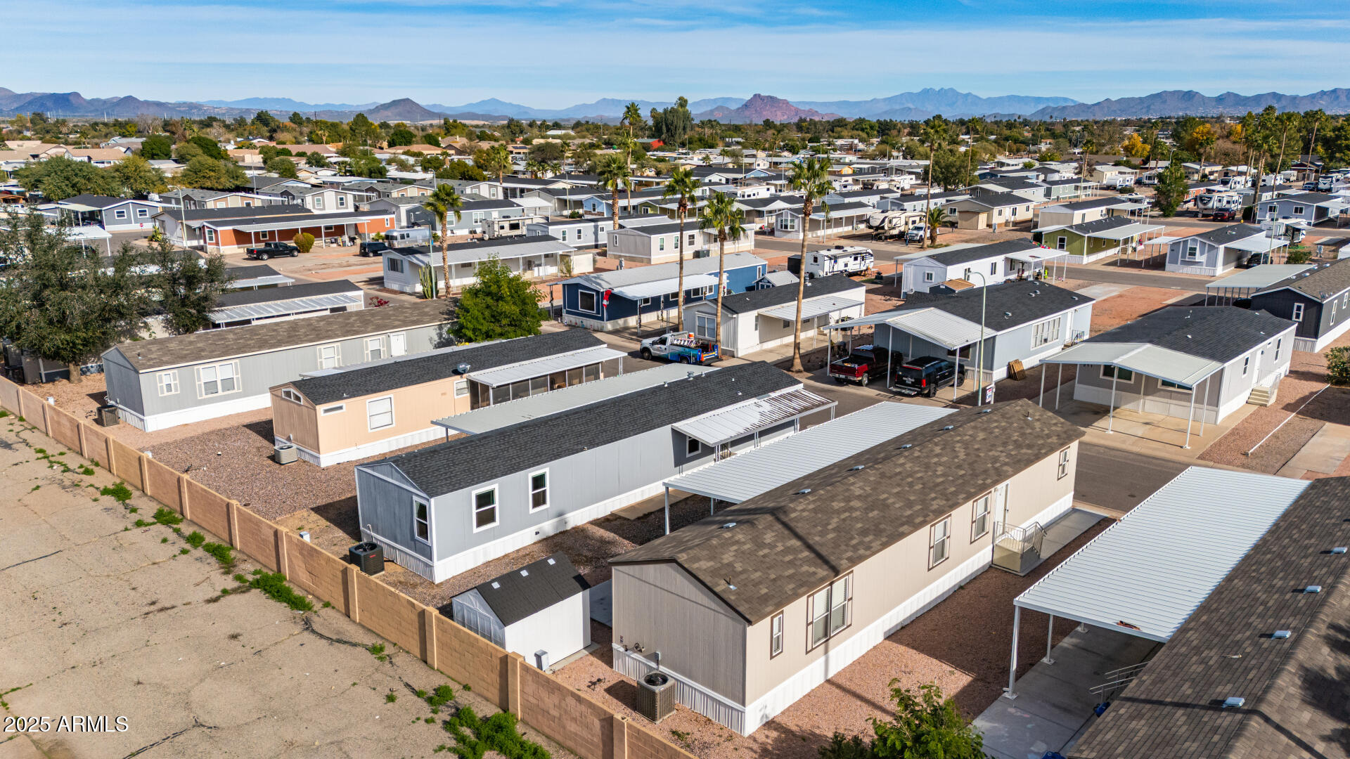 320 East McKellips Road, Unit 230 Mesa, AZ 85201 - Photo 30 of 43 an aerial view of a house with a city view