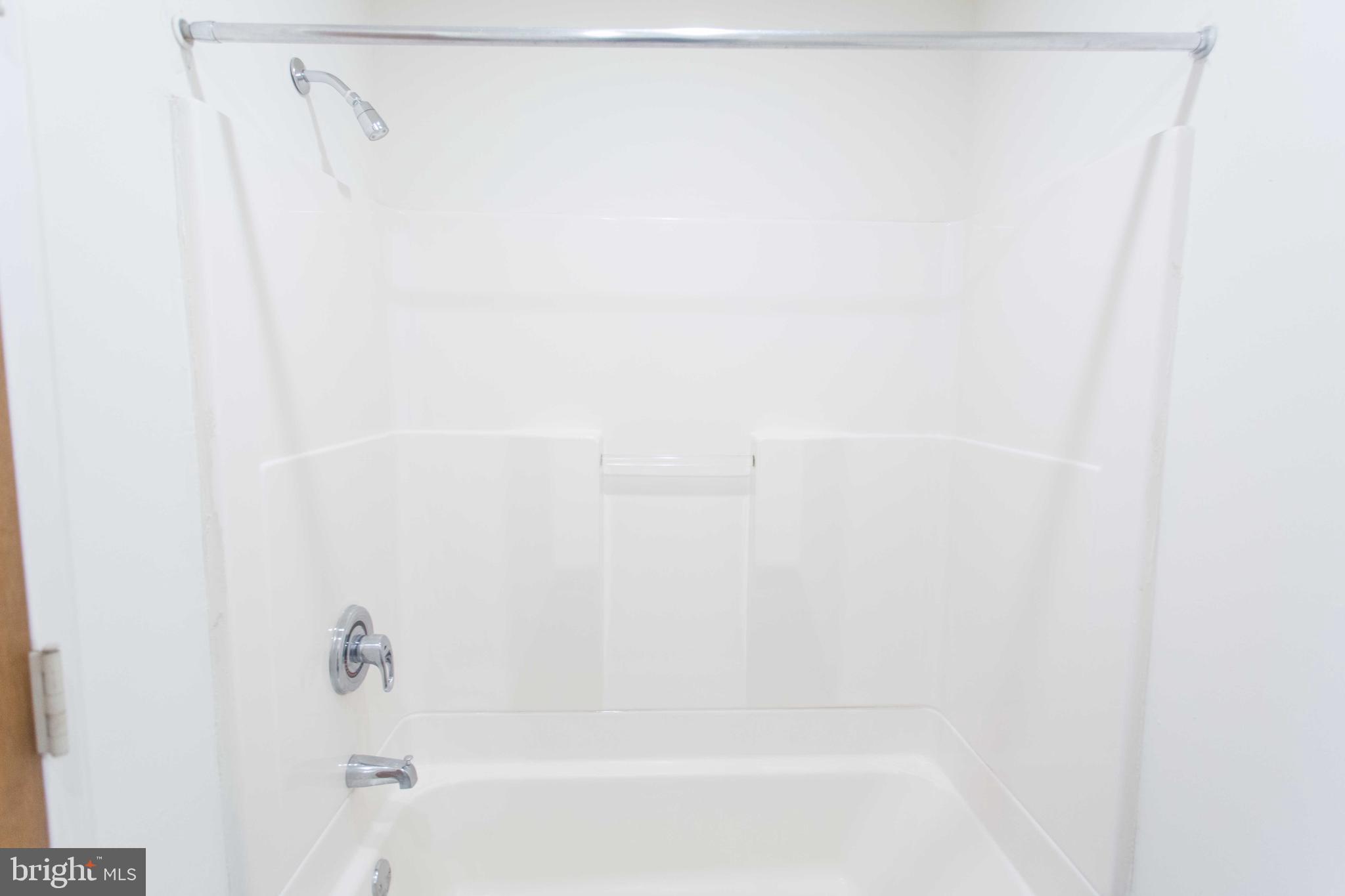 1600-2 Walnut Street, Unit 405 Philadelphia, PA 19103 - Photo 16 of 22 a close up of a bathtub