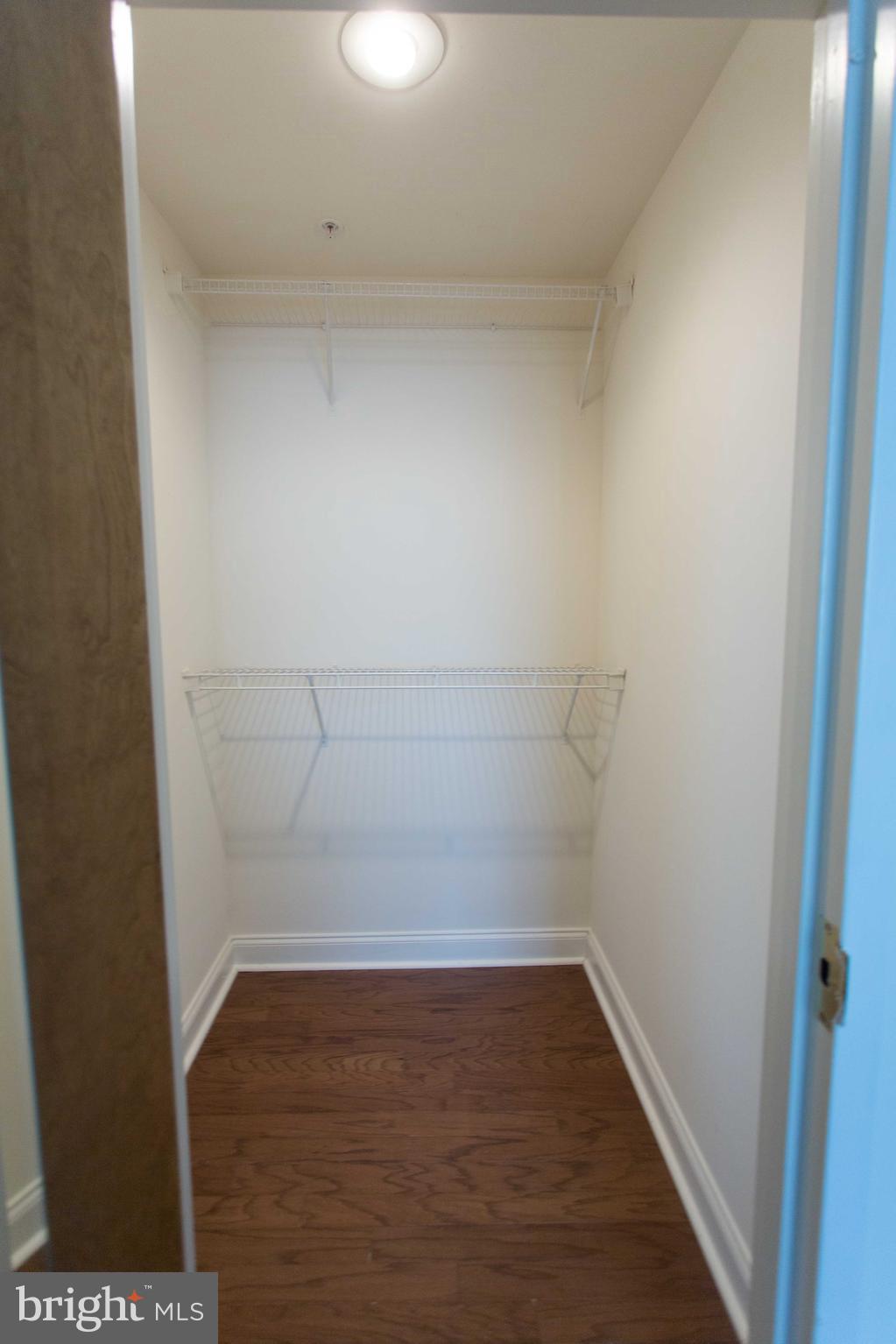 1600-2 Walnut Street, Unit 405 Philadelphia, PA 19103 - Photo 22 of 22 a empty closet with wooden floor