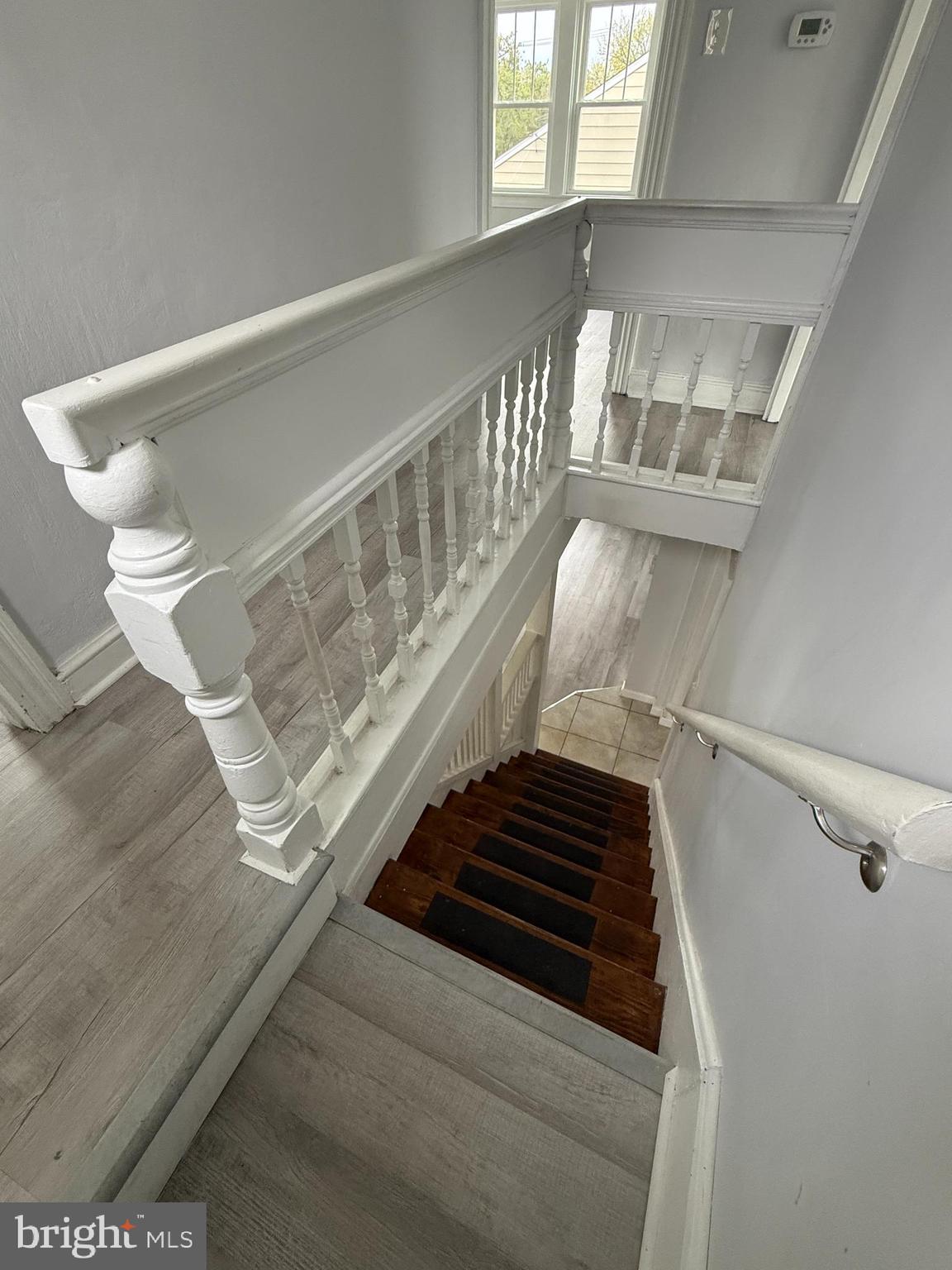 1036 South Spring Road Vineland, NJ 08361 - Photo 20 of 31 a view of staircase with white walls and a window
