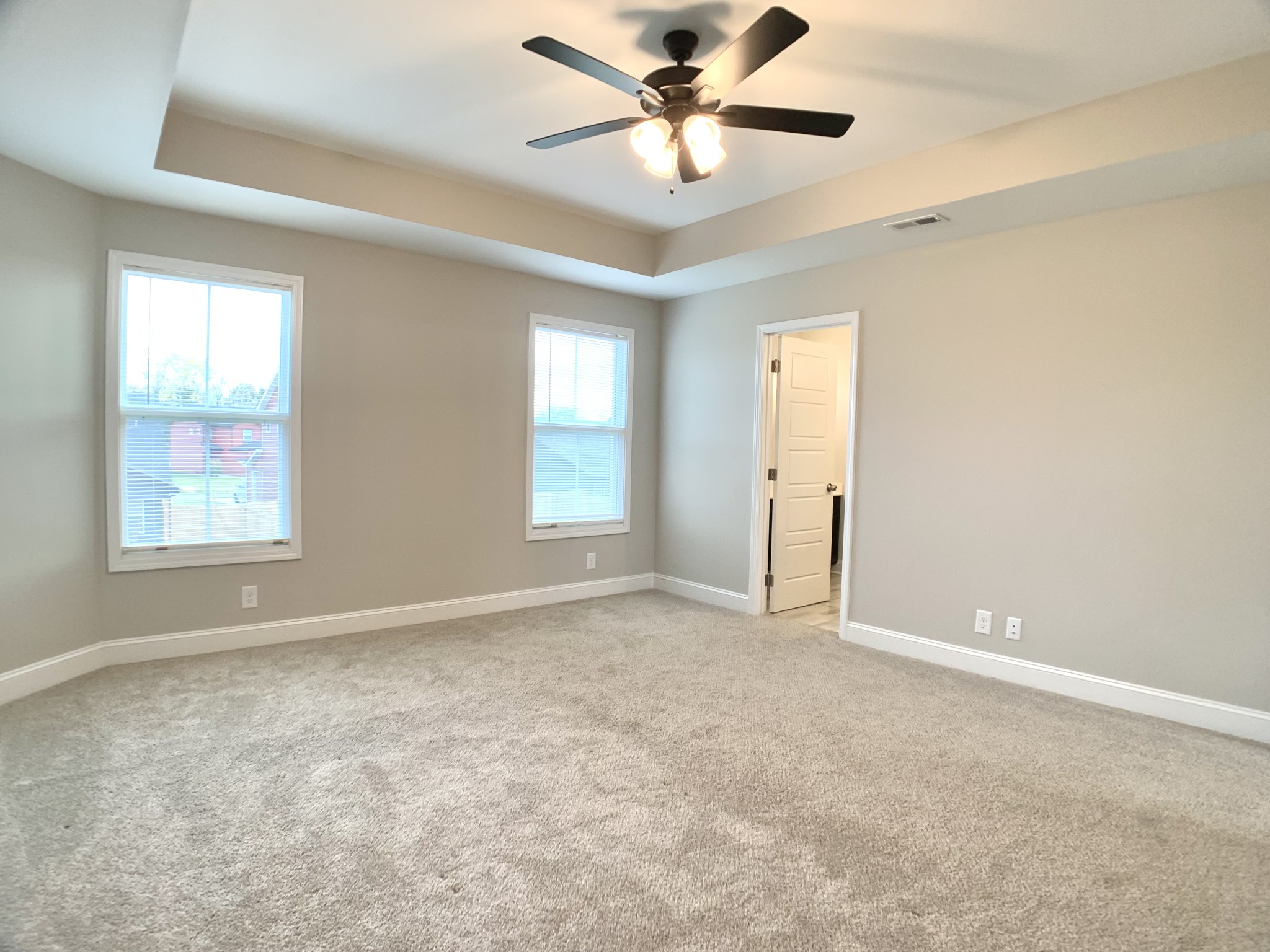 208 Copeland Road Clarksville, TN 37042 - Photo 16 of 35 an empty room with windows and fan