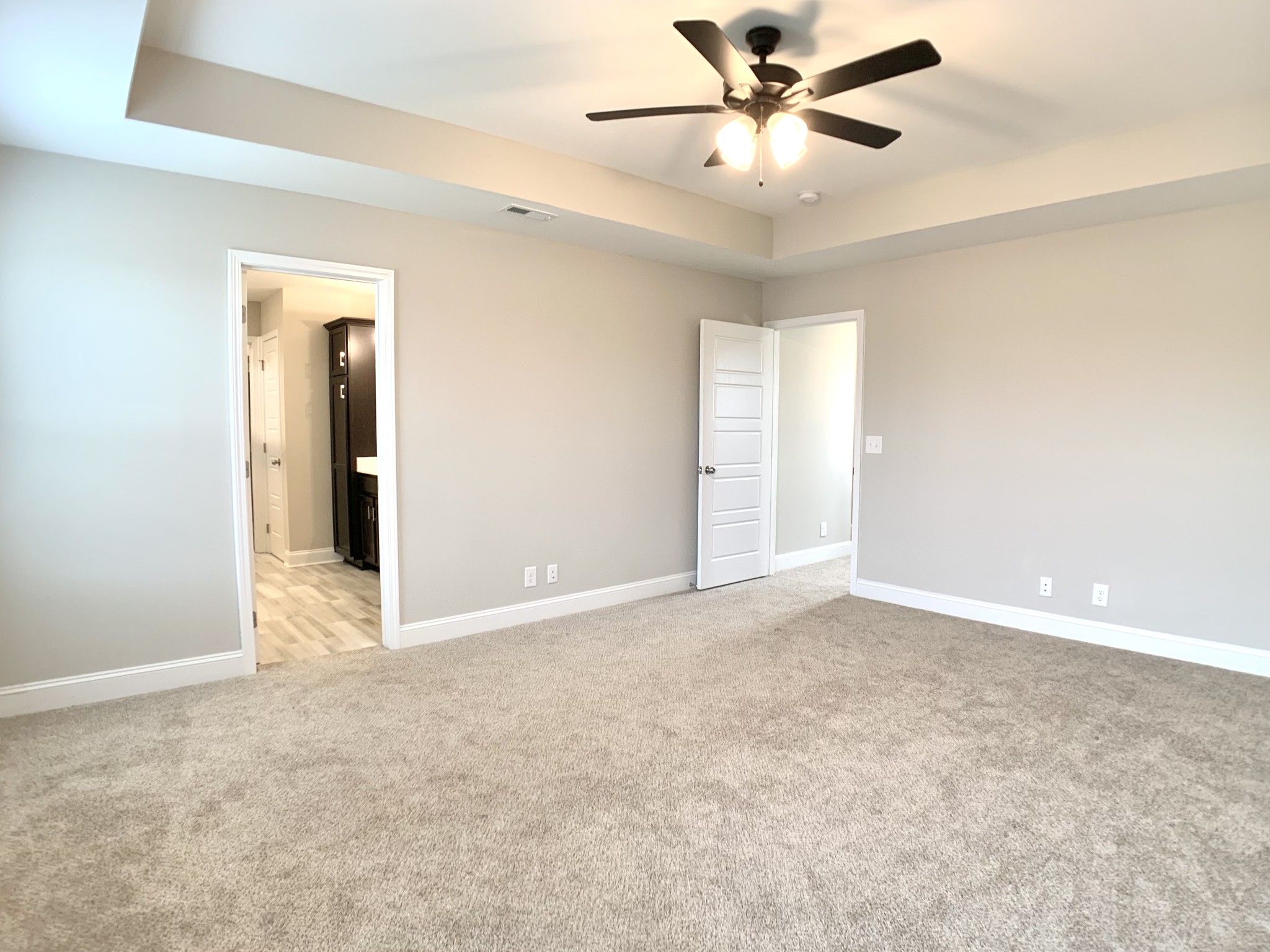 208 Copeland Road Clarksville, TN 37042 - Photo 17 of 35 an empty room with a ceiling fan and a window