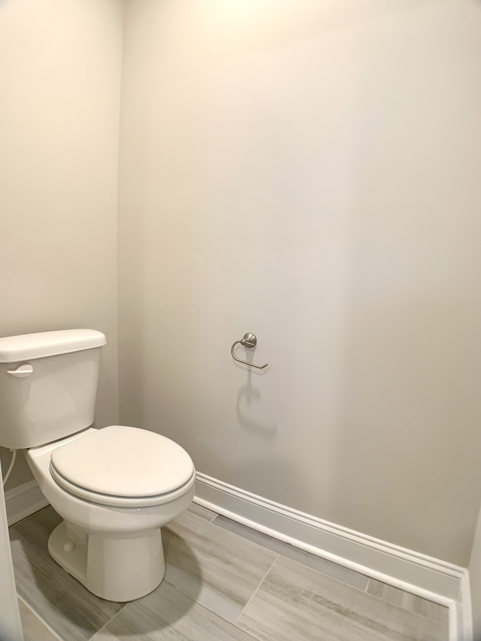 208 Copeland Road Clarksville, TN 37042 - Photo 21 of 35 a white toilet sitting next to a white wall