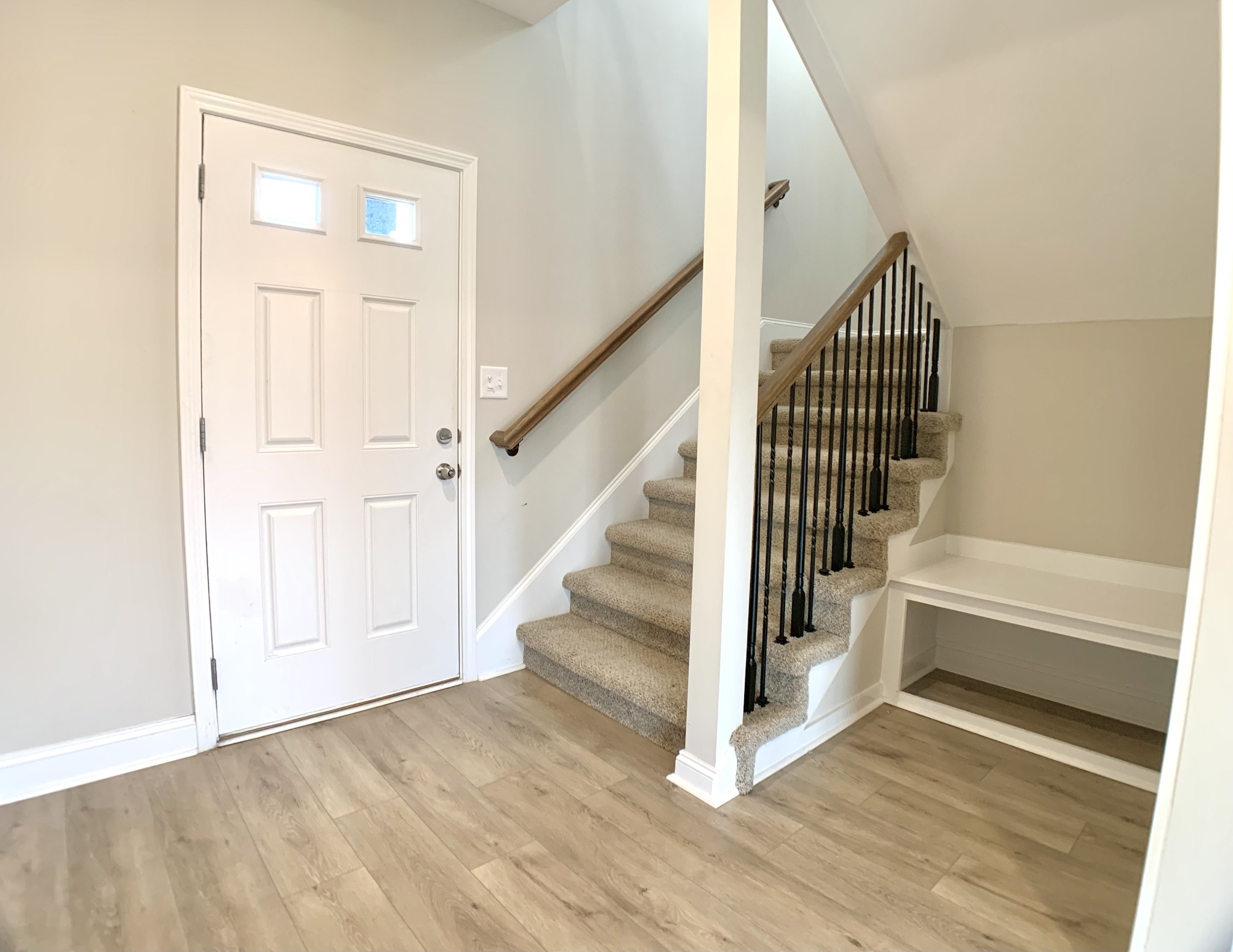 208 Copeland Road Clarksville, TN 37042 - Photo 3 of 35 a view of entryway with wooden floor and stairs
