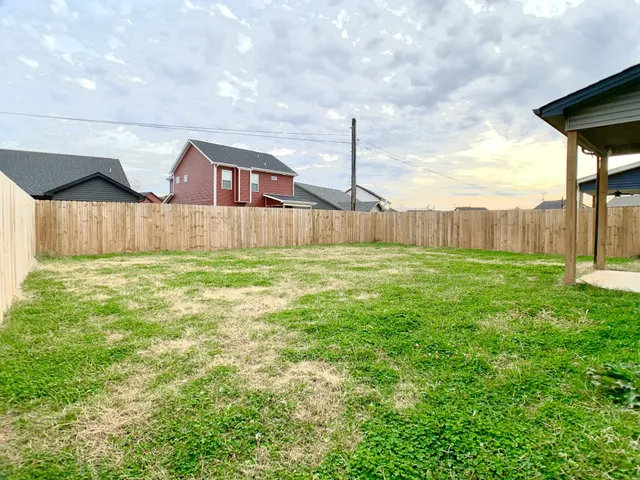 a house view with a garden space