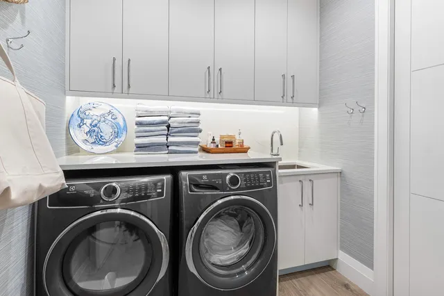 a utility room with dryer and washer