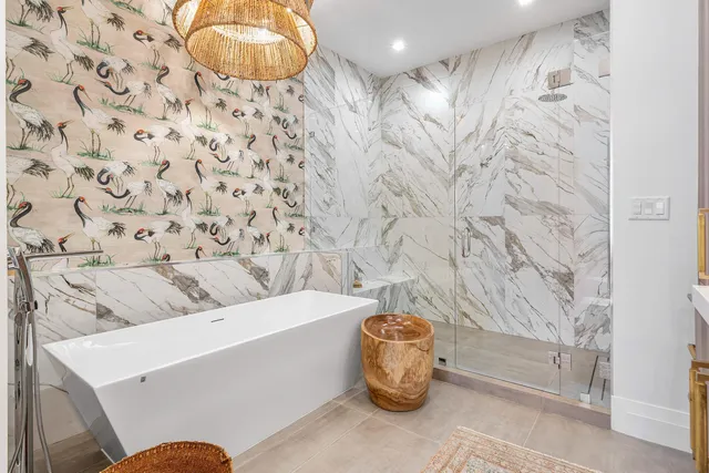 a bathroom with a bathtub and shower curtain