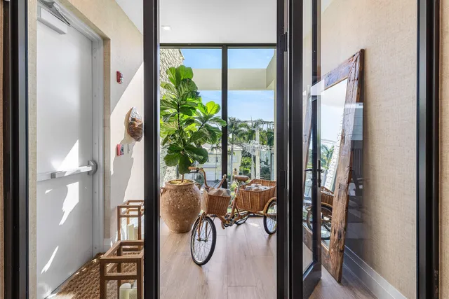 a view of entryway with wooden floor