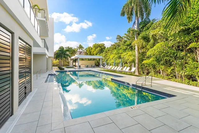 a view of a swimming pool with a patio