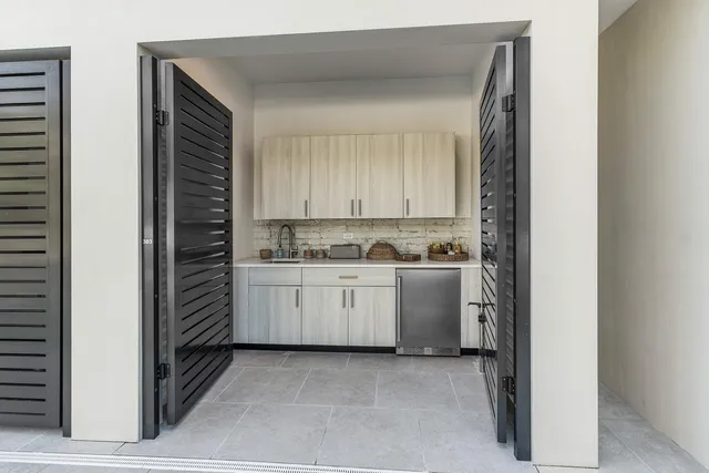 a view of a kitchen with a sink