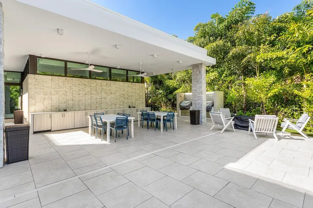 a outdoor space with lots of furniture and garden