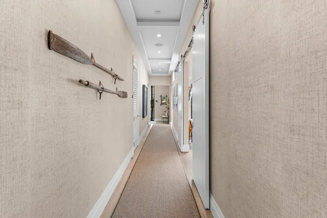 a view of a hallway with a white walls