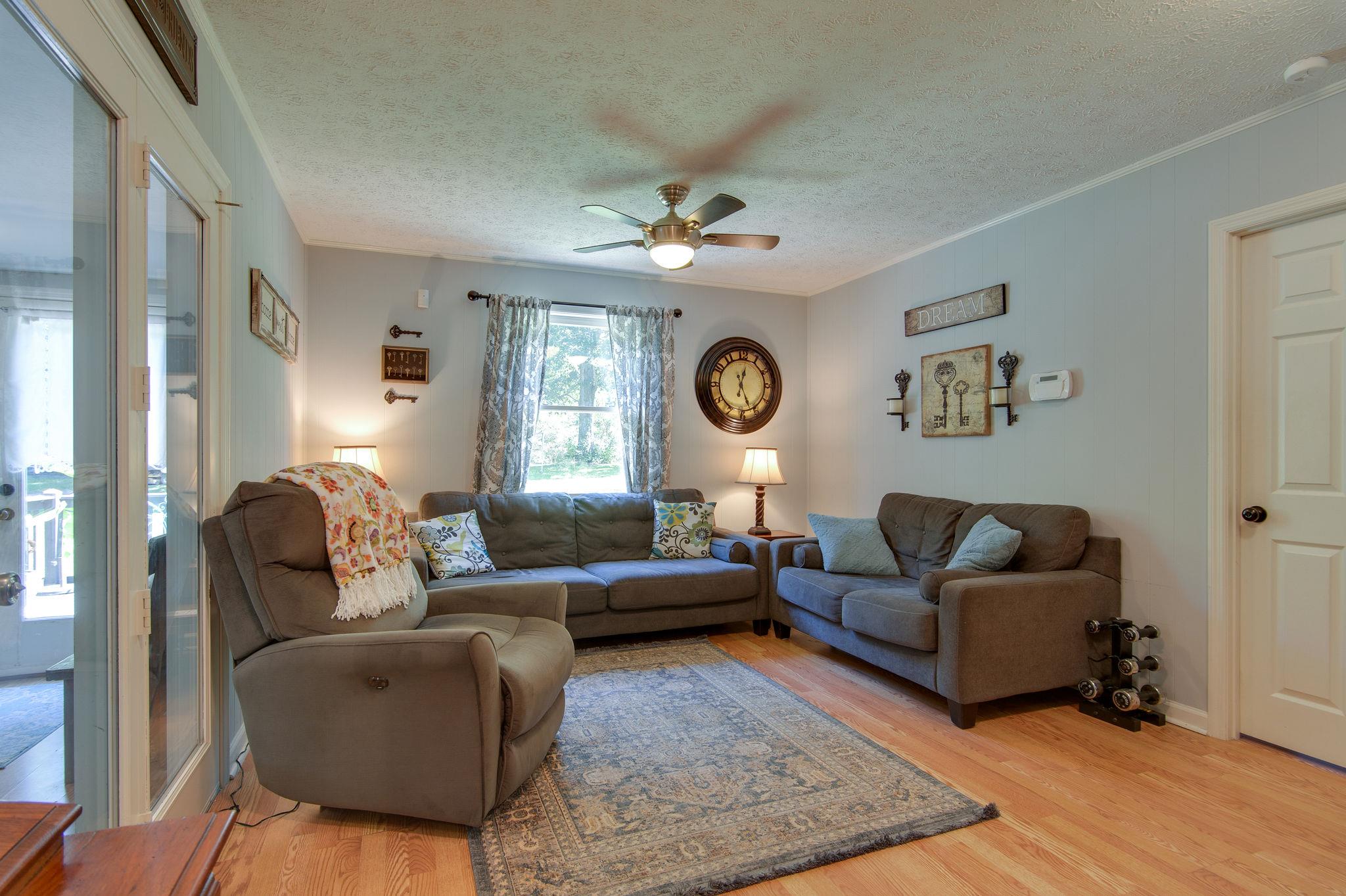 7116 Crow Cut Road Fairview, TN 37062 - Photo 11 of 30 a living room with furniture and a window