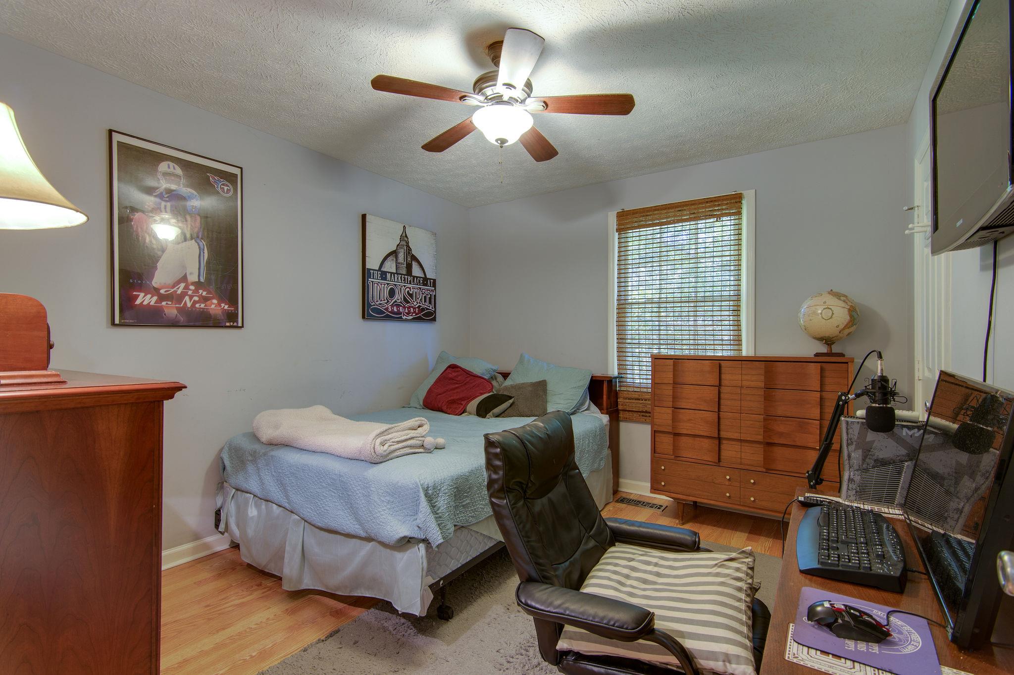 7116 Crow Cut Road Fairview, TN 37062 - Photo 23 of 30 a living room with furniture and a window