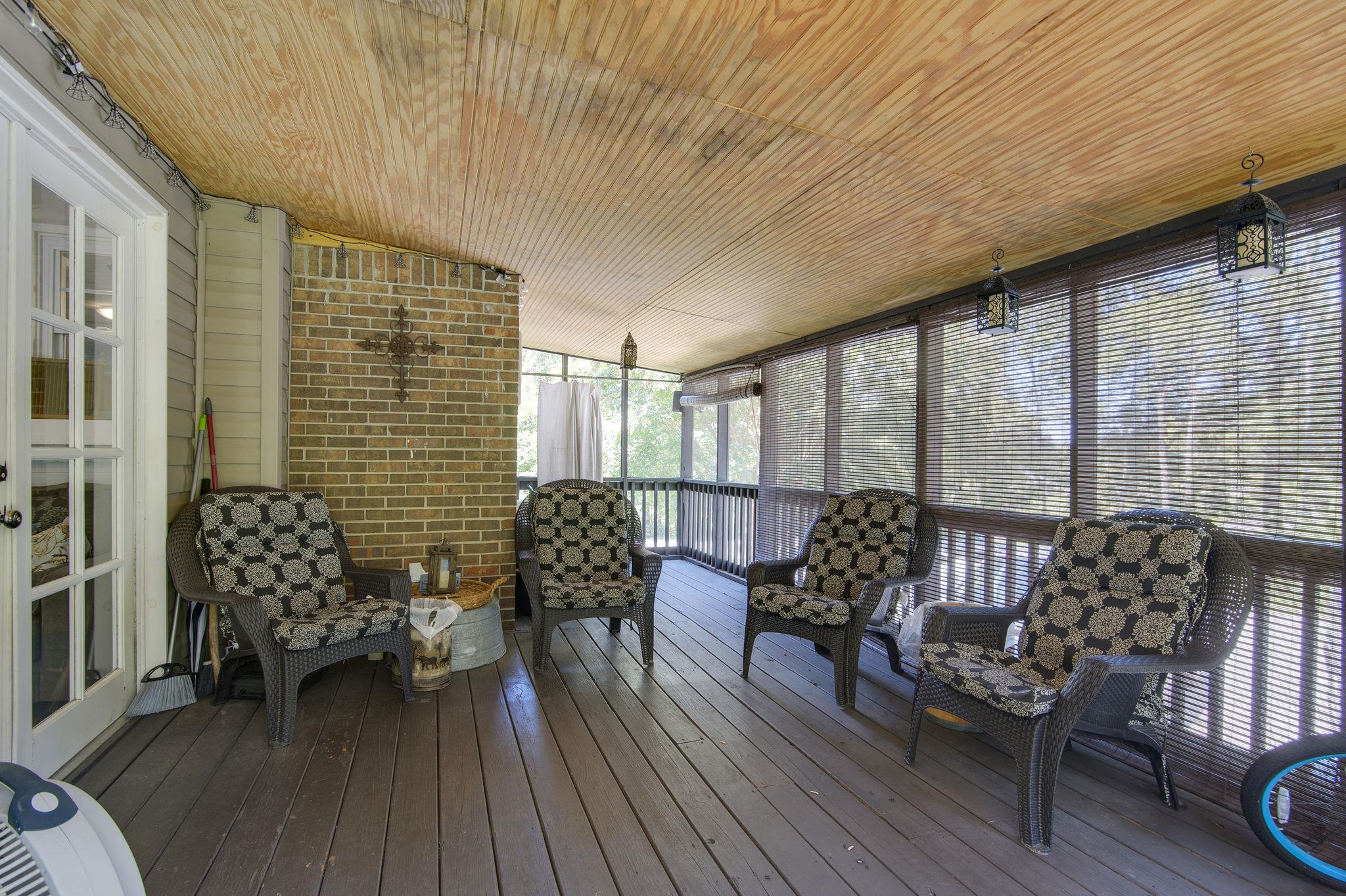 7116 Crow Cut Road Fairview, TN 37062 - Photo 25 of 30 a balcony with furniture and wooden floor