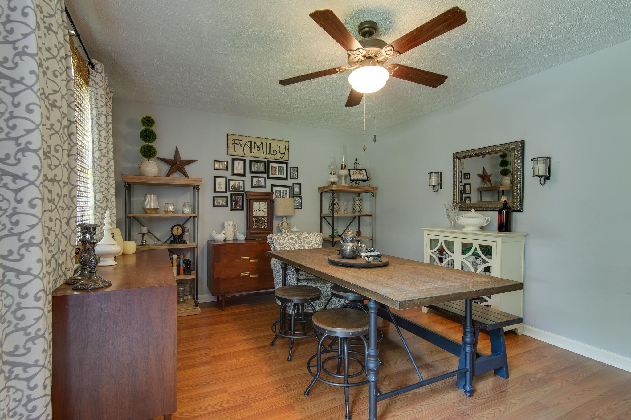 7116 Crow Cut Road Fairview, TN 37062 - Photo 4 of 30 a view of a dining room with furniture