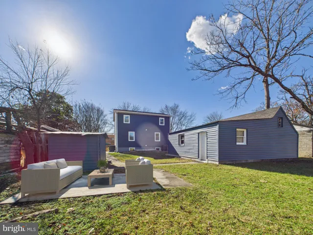 a view of swimming pool with outdoor seating
