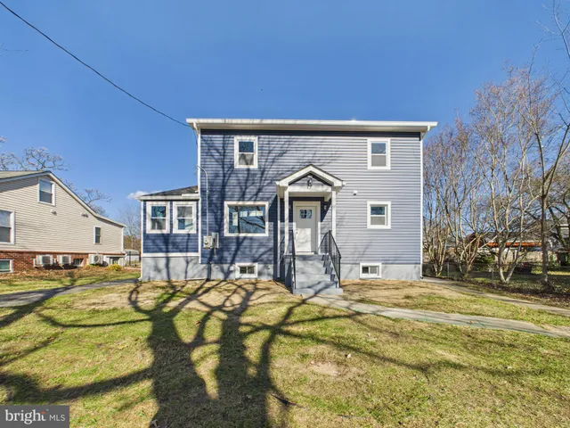 a view of a balcony with a potted plant