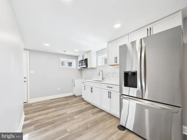 wooden floor in a room with a window