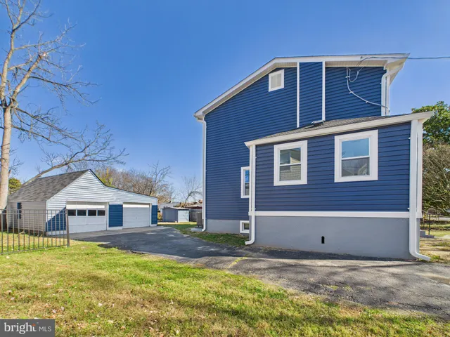 a view of a house with a big yard