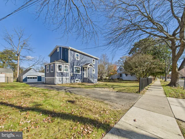 a view of a yard with a swimming pool