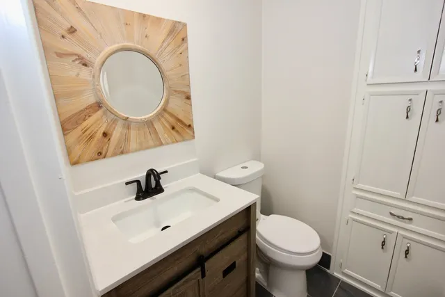a view of a kitchen with cabinets